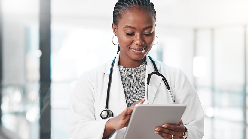 Shot of a young doctor using a digital tablet in a modern hospital